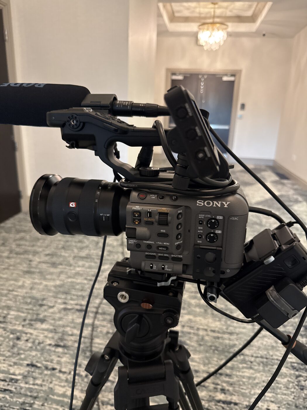 Sony cinema camera and shotgun mic on a CNB Creative production