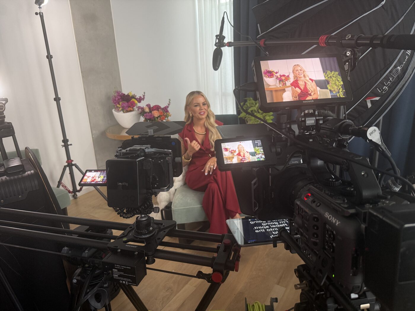 CNB Creative interview set with cinema camera, slider, and studio lighting
